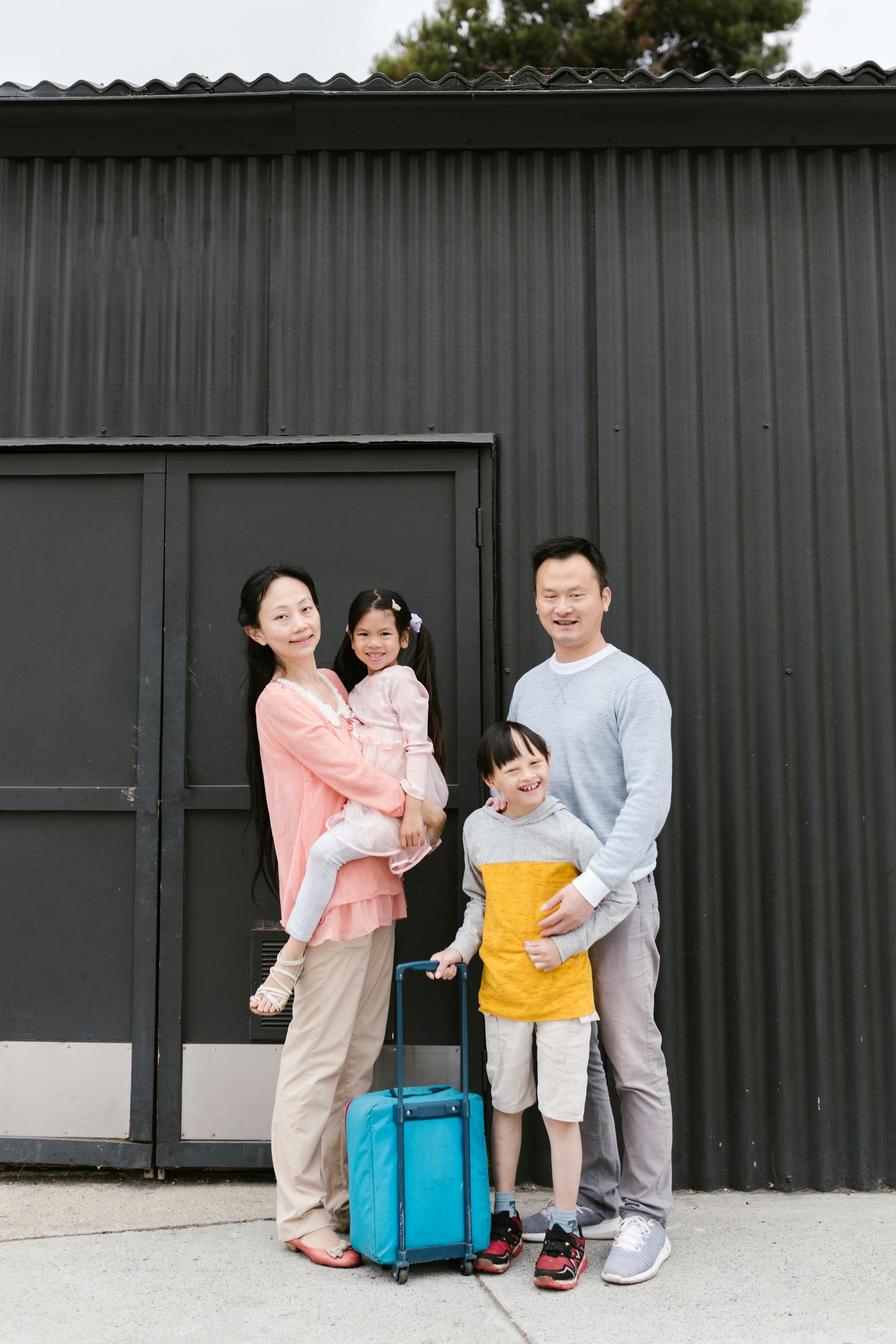 Happy family with children excited and ready for an educational camp adventure